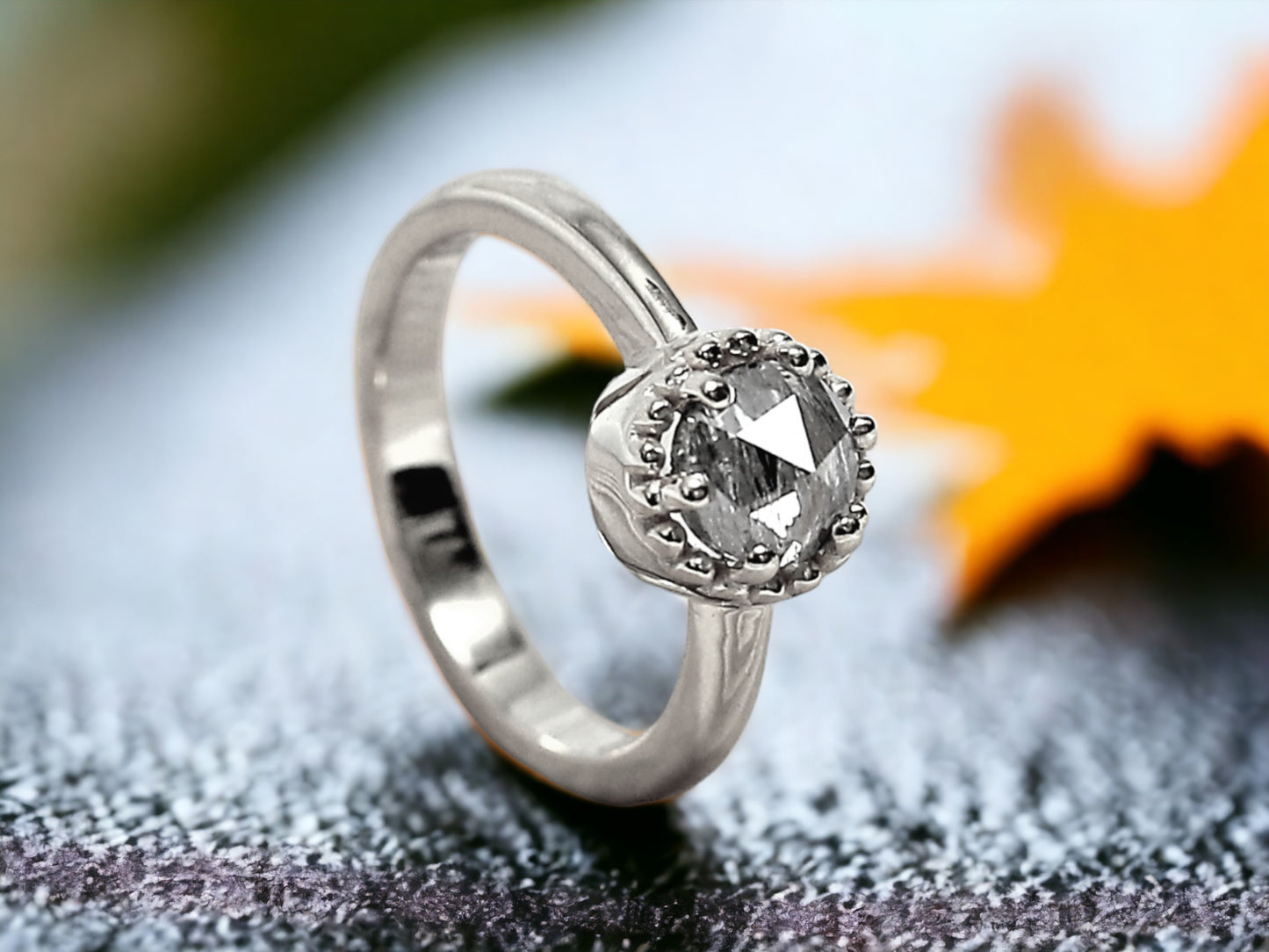 Round Rose Cut Salt and Pepper Diamond Ring featuring a 1.15 CT natural salt and pepper diamond with galaxy-like black and white inclusions in a minimalist design with a straight 1.30 mm delicate band and clean handcrafted finish.
