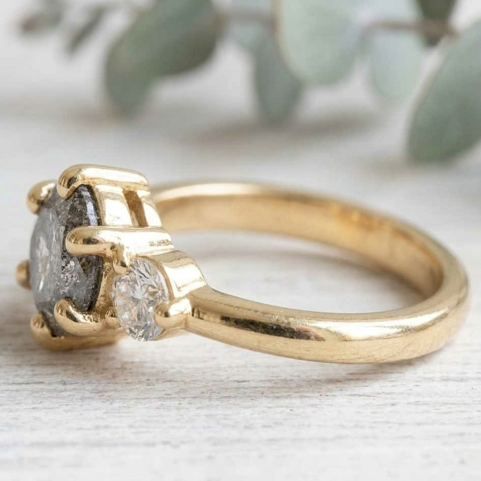 Round Salt and Pepper Diamond Engagement Ring featuring a 1.00 CT natural salt and pepper diamond with organic inclusions, accented by round brilliant side diamonds in a minimalist straight shank design with a 1.80 mm band in fine gold.