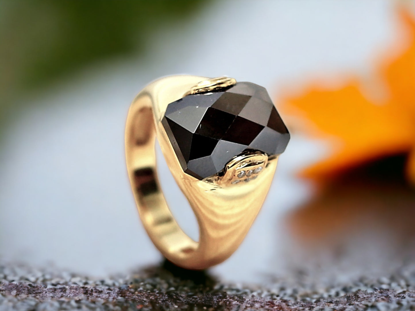 Salt and Pepper Pyramid Diamond Ring featuring a 3.75 CT natural gray pyramid cut diamond with speckled organic inclusions, accented by round diamond side stones in a bezel set geometric design with a reverse tapered 2.70 mm band, handcrafted as a bold modern statement ring.