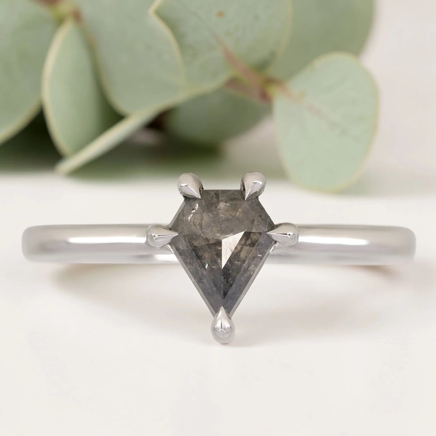 Shield Cut Salt and Pepper Diamond Ring featuring a 0.85 CT natural salt and pepper diamond with galaxy-like inclusions in a wide bezel setting, handcrafted rope twist band, and alternative bridal jewelry design.
