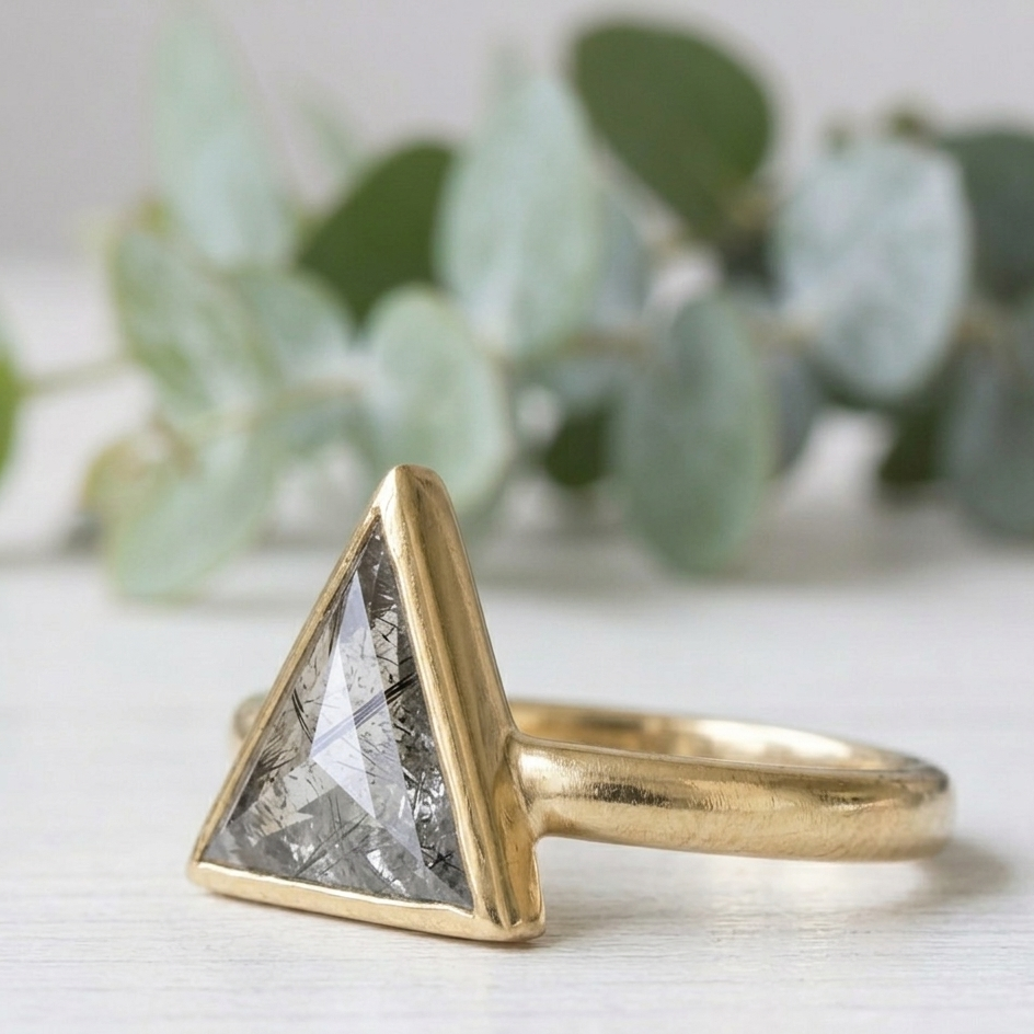 Triangle Cut Salt and Pepper Diamond Ring featuring a 1.46 CT natural salt and pepper diamond with organic inclusions in a minimalist rustic modern design with a straight 1.80 mm band and handcrafted fine jewelry finish for everyday engagement wear.