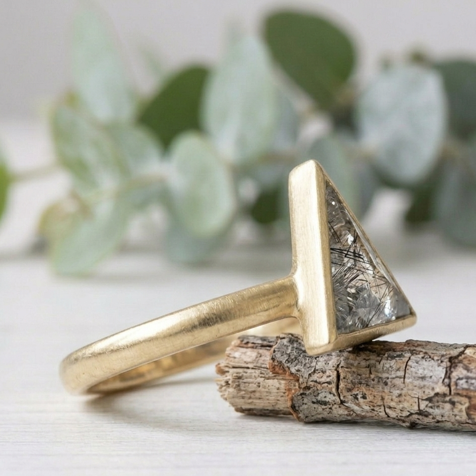 Triangle Cut Salt and Pepper Diamond Ring featuring a 1.46 CT natural salt and pepper diamond with organic inclusions in a minimalist rustic modern design with a straight 1.80 mm band and handcrafted fine jewelry finish for everyday engagement wear.
