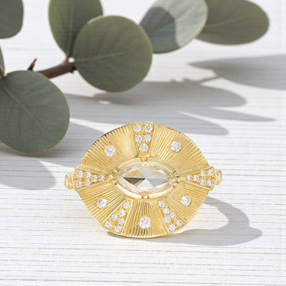 Victorian style diamond ring featuring an engraved talisman design with intricate handcrafted detailing, antique inspired metalwork, and a timeless elegant engagement ring aesthetic with vintage fine jewelry craftsmanship.